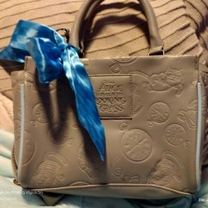 RARE lounge fly alice through the looking glass purse